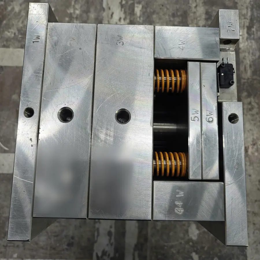 CNC machined injection mould tool assembly with numbered plates, die springs and limit switch